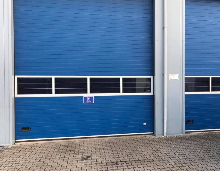 Nieuwe overheaddeur voor uw bedrijfspand? Elzinga Bedrijfsdeuren Techniek levert maatwerk